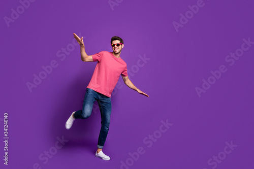 Fototapeta Naklejka Na Ścianę i Meble -  Full size photo of cheerful cool guy night club music lover dance disco floor enjoy hip hop rock concert free time wear style stylish outfit footwear isolated bright color background