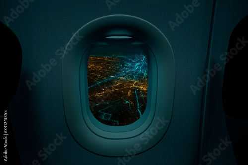 Night cityscape from airplane two window  Travel and tourism concept.