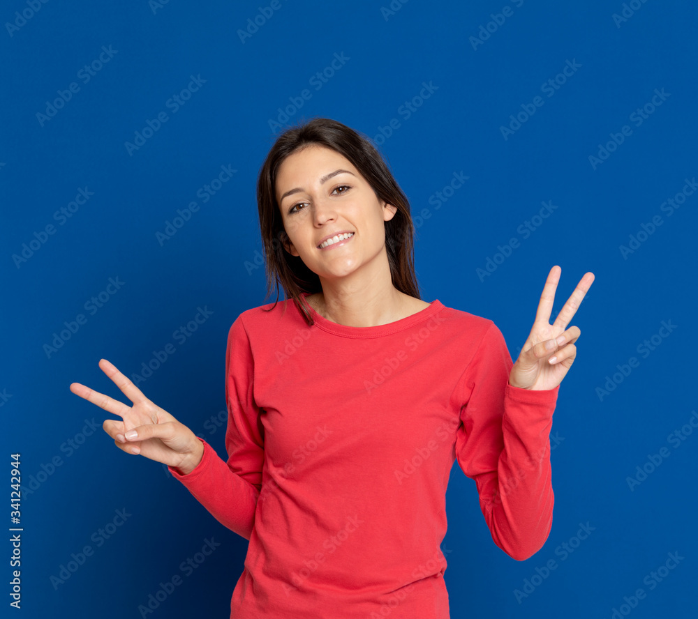 Brunette young woman wearing a red T-shirt