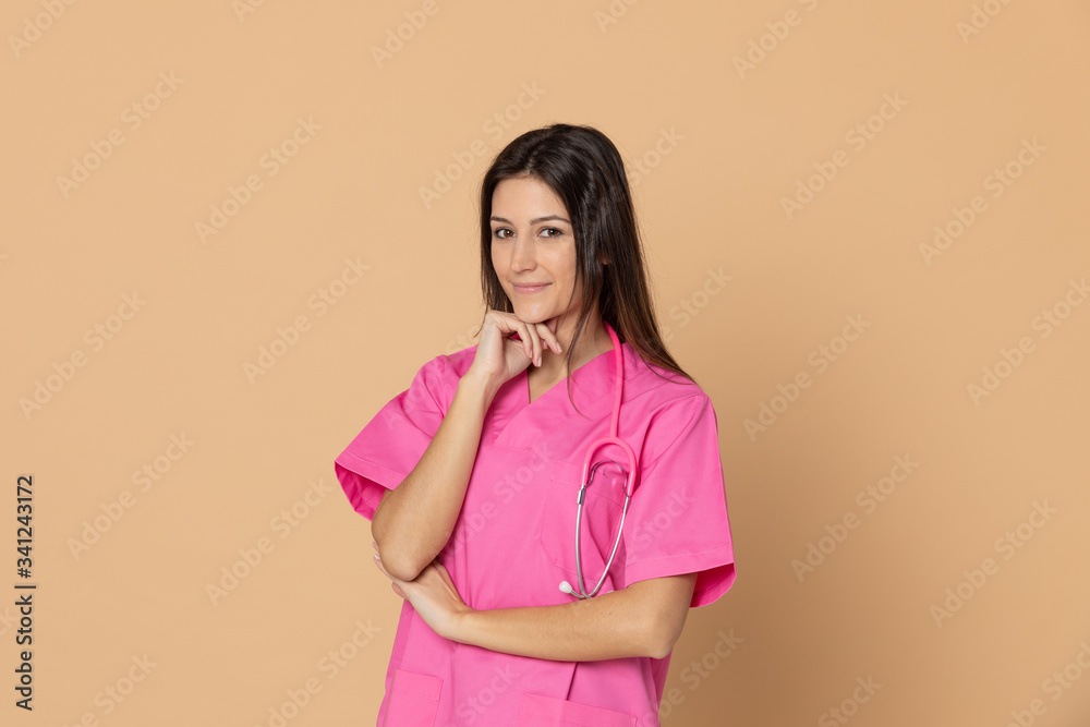 Young doctor with a pink uniform Young doctor with a pink uniform