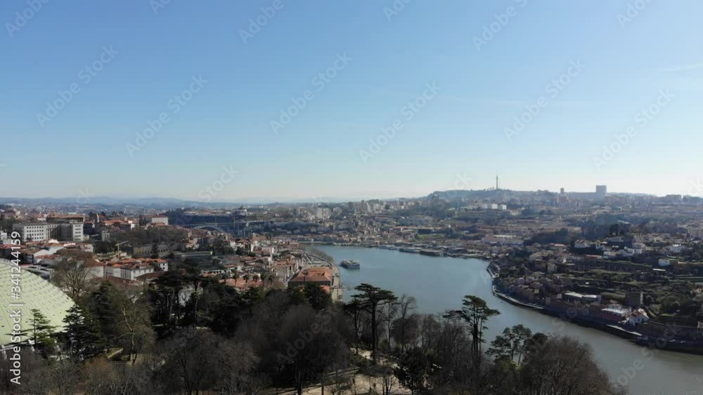 A very cinematic aerial shot overlooking Porto towards it's Ribeira on a clear afternoon during March 2020. Flying sunset produced some stunning images on the city's A very cinematic aerial shot overlooking Porto towards it's Ribeira on a clear afternoon during March 2020. Flying sunset produced some stunning images on the city's