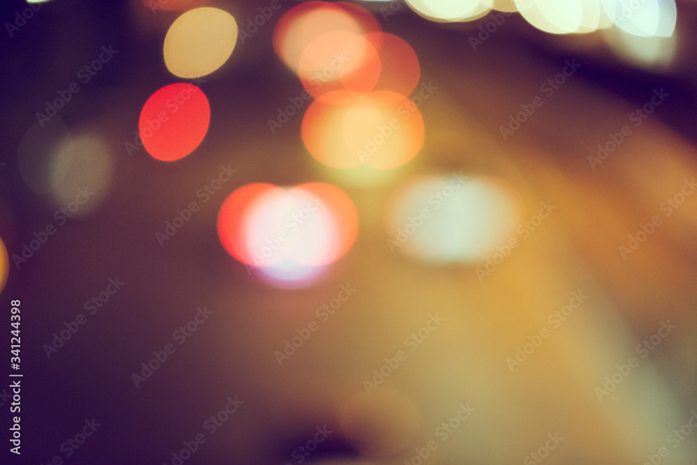 Abstract defocus of bokeh light traffic in the city