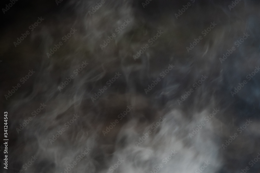 Black and white abstract smoke on a dark background