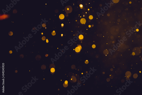 Dark Abstract Gold bokeh sparkle on black