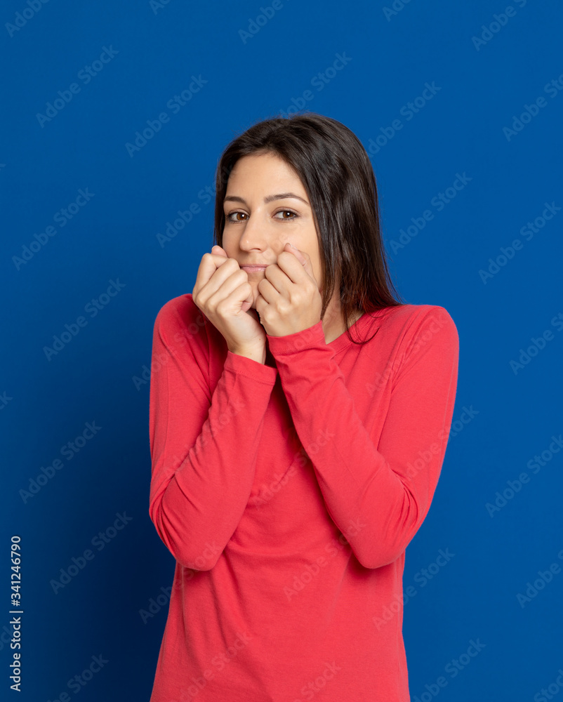 Brunette young woman wearing a red T-shirt Brunette young woman wearing a red T-shirt