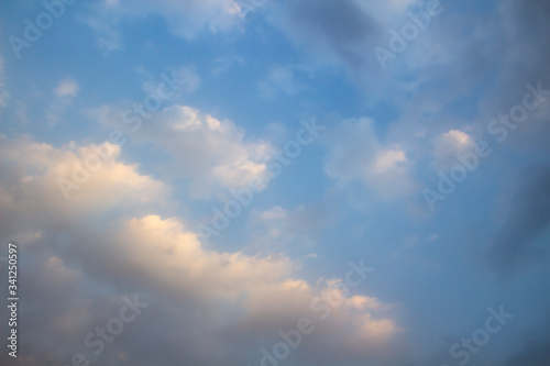 Clouds in the blue sky. A beautiful clouds against the blue sky background. Beautiful cloud pattern in the sky.