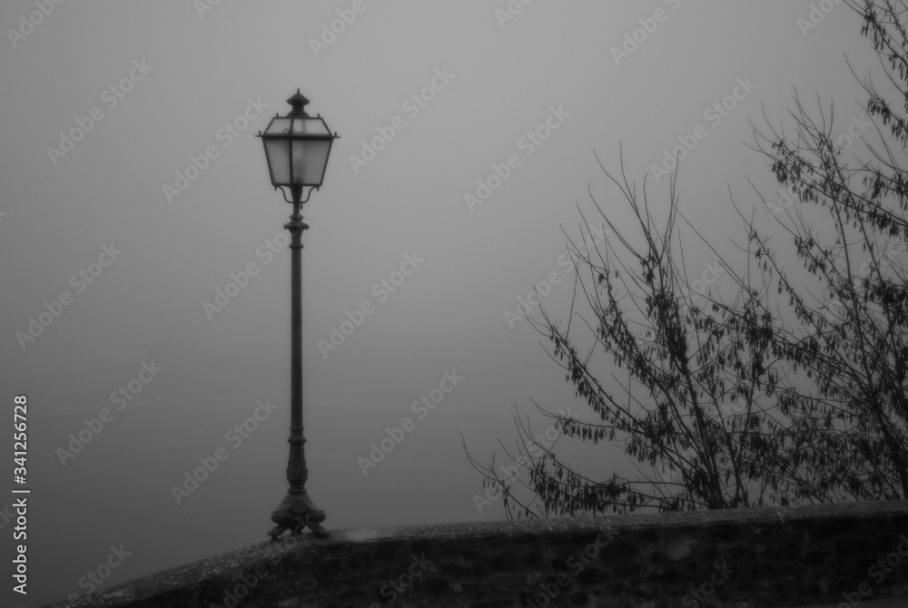 Ancient lantern in the fog