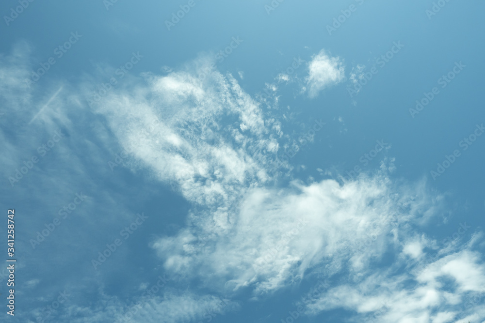 Cumulus cloud on beautiful blue sky in day light , Fluffy clouds formations at tropical zone Cumulus cloud on beautiful blue sky in day light , Fluffy clouds formations at tropical zone