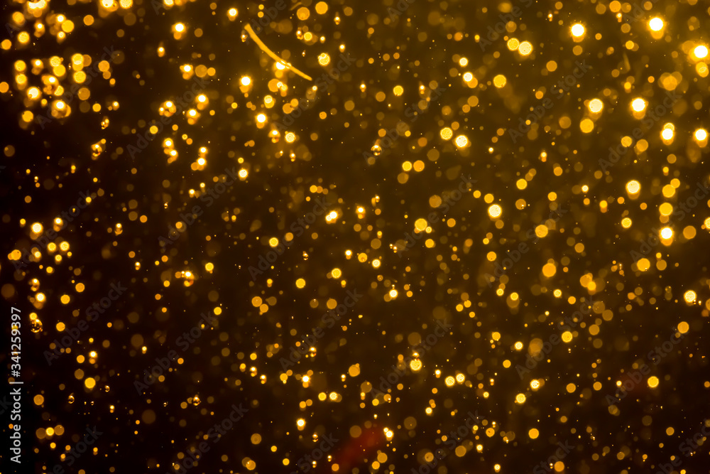 Golden blur glitter lights abstract bokeh for Merry Christmas and New Year Golden blur glitter lights abstract bokeh for Merry Christmas and New Year