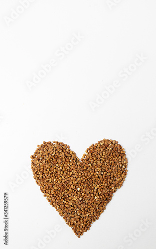 Heart shaped buckwheat on a white background