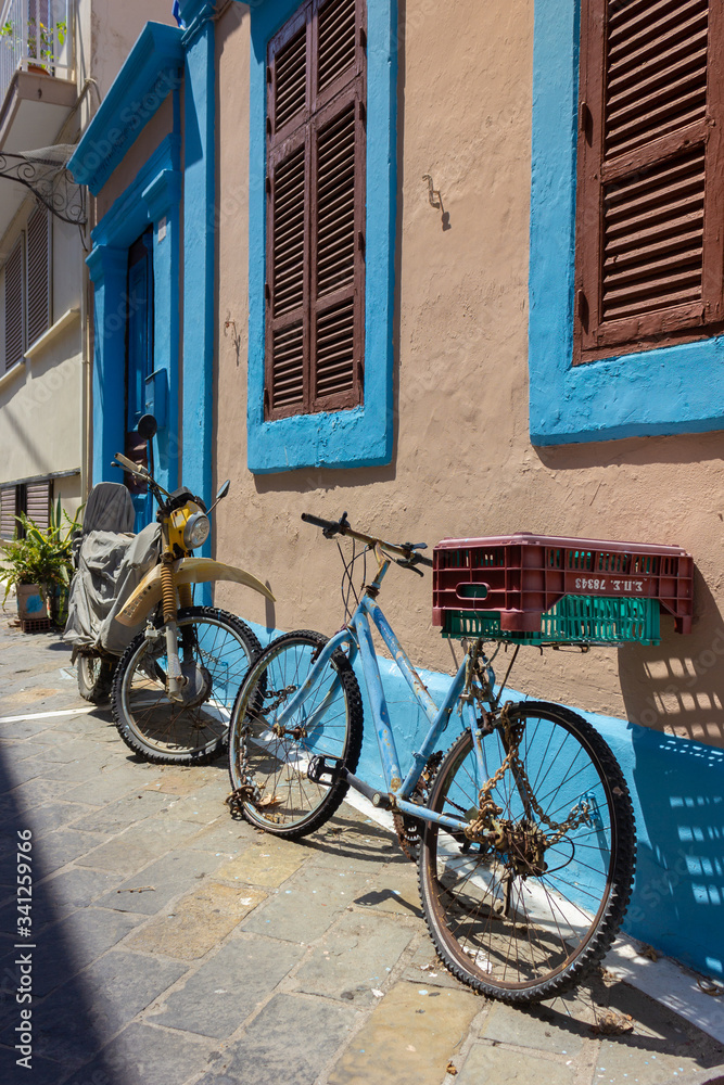 Greece Rhodes, 11/07/2018 : Walk around the old town. Bicycles against the wall with beautiful styling.