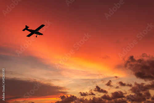 airplane in the sunset