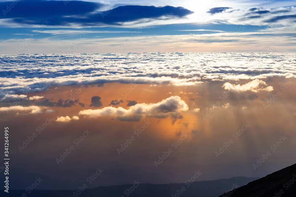 Beutiful cloud ocean above the sea. View from the top of Bali island, Indonesia.
