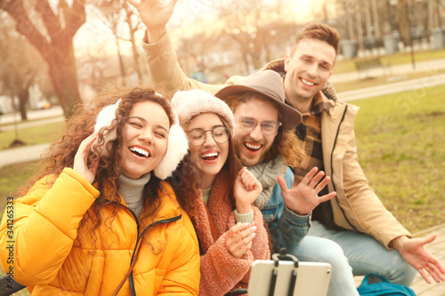 Happy friends taking selfie...
