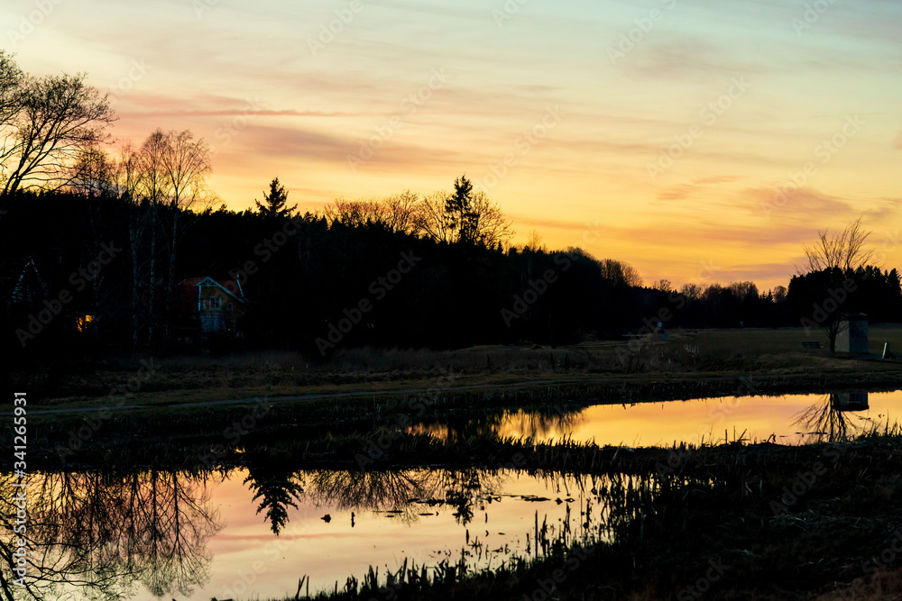 Fototapeta premium Magical reflections in Swedish sunset