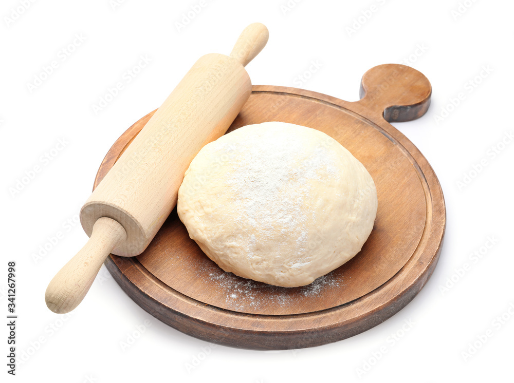 Fresh dough and rolling pin on white background Fresh dough and rolling pin on white background