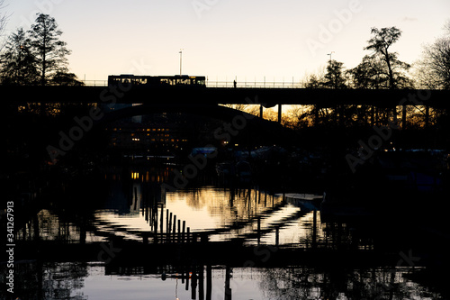 STOCKHOLM, SWEDEN; March 21 2019: Urban magical reflections in Swedish sunset. Långholmsbron bridge.