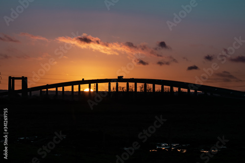 Sunset under a road bridge in England