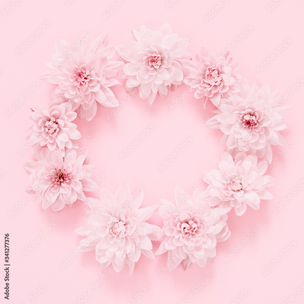 Beautiful flowers composition. Pink flowers on pastel pink background. Soft floral background. Flat lay, top view, copy space, square