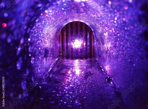 luminous purple fantastic tunnel as a portal in space in creative photography