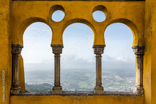 Vue out of an opening in Pena Palace in Sintra Portugal