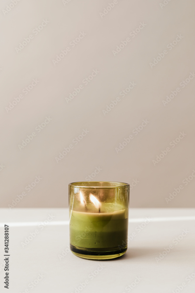Burning candle in a glass mockup Burning candle in a glass mockup