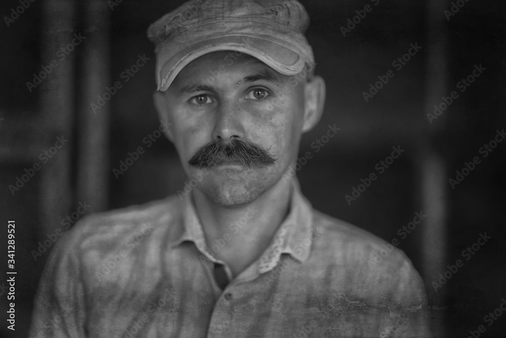 vintage hipster mustache, portrait of a man with a long mustache, unusual look