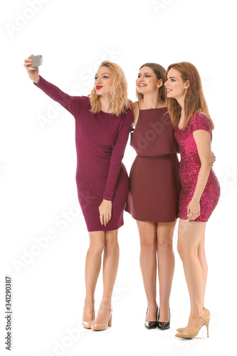 Happy young women taking se...