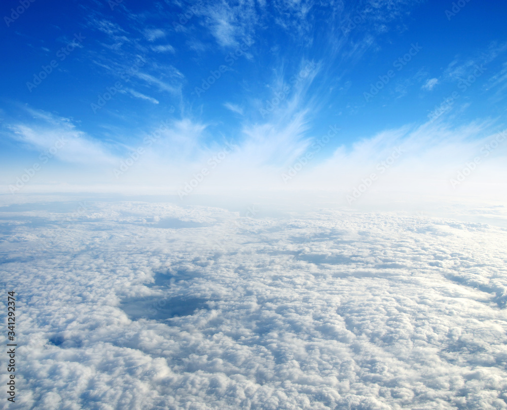 Naklejka premium White clouds. View from the window of an airplane