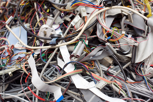 A pile of discarded computer wiring and components waiting for WEEE recycling