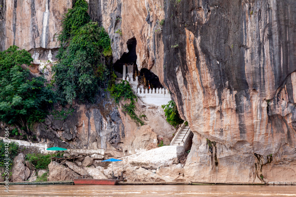 Tham Ting Cave Or Pak Ou Caves the famous Caves in Luang Prabang Laos Stock  Photo | Adobe Stock