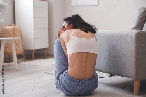 Young woman suffering from ...