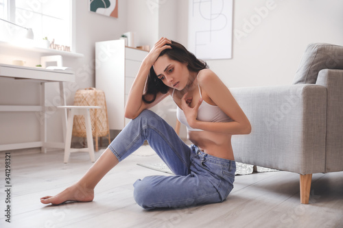 Young woman suffering from ...
