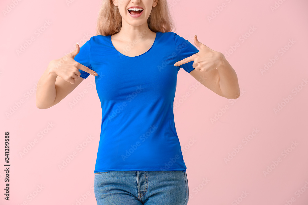 Woman in stylish t-shirt on color background Woman in stylish t-shirt on color background
