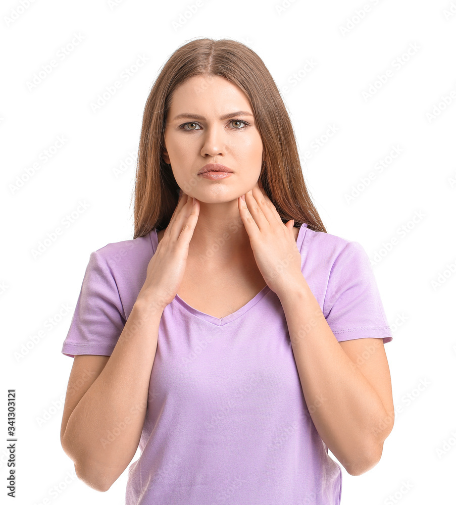 Young woman with thyroid gland problem on white background Young woman with thyroid gland problem on white background