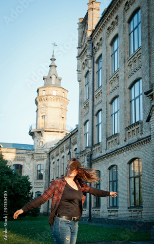 student girl near the university building