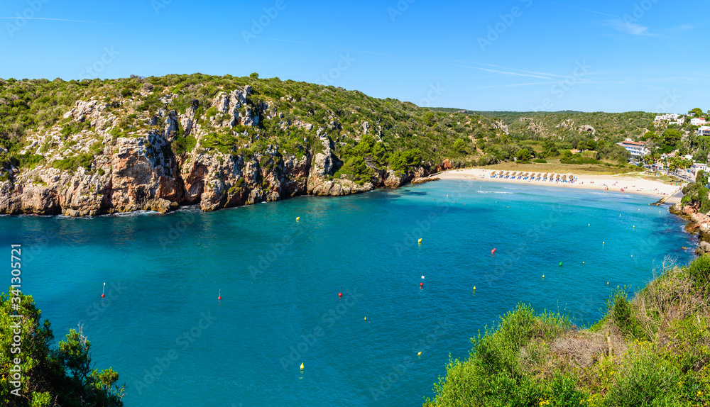 Cala En Porter Beach, one of the best resort beaches on Menorca, Spain