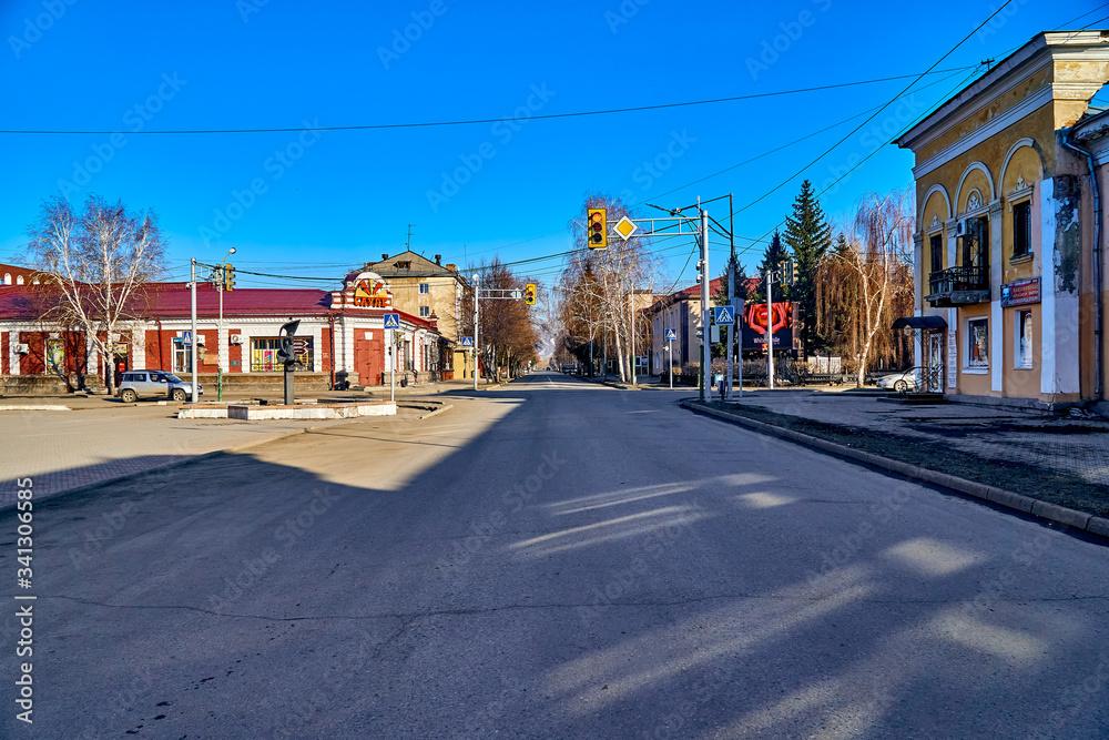 UST-KAMENOGORSK, KAZAKHSTAN - APRIL 04, 2020: Strange, amazing, unusual view of the empty streets of spring Ust-Kamenogorsk due to a pandemic - all people are sitting at home because of quarantine, KZ