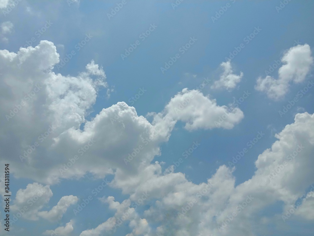 Blue sky and clouds backgrounds and textures closeup for wallpaper interior design. Very beautifully. Blue sky and clouds backgrounds and textures closeup for wallpaper interior design. Very beautifully.