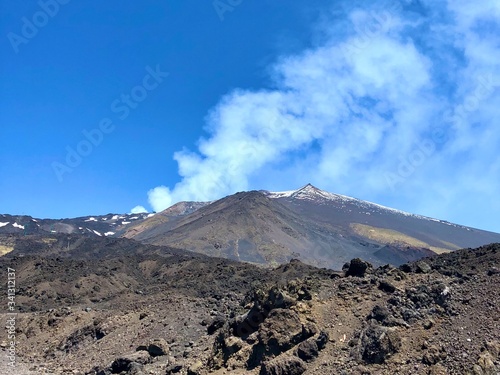 White smoke from the crater of the volcano Etna, Sicily, Italy