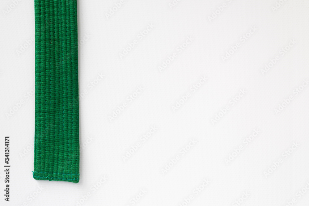 Zen art. green belt martial arts on white background. Substrate for