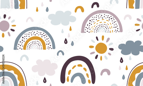 Seamless vector pattern with hand drawn rainbows and sun.