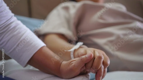 Hopeful, care love emotional concept, Couple women hold hands lover while Sick Patients saline, Iv drip, intravenous needle in Hospital, feeling love soothe. Encouragement comforting Recovering moment
