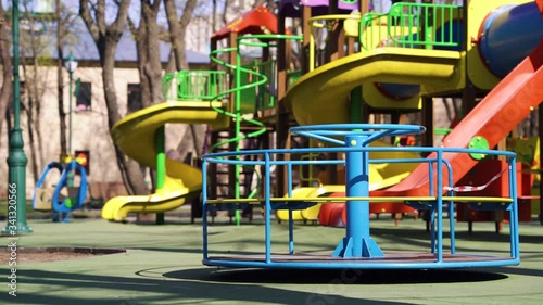 Wallpaper Mural Carousel spinning on empty playground during pandemic Torontodigital.ca
