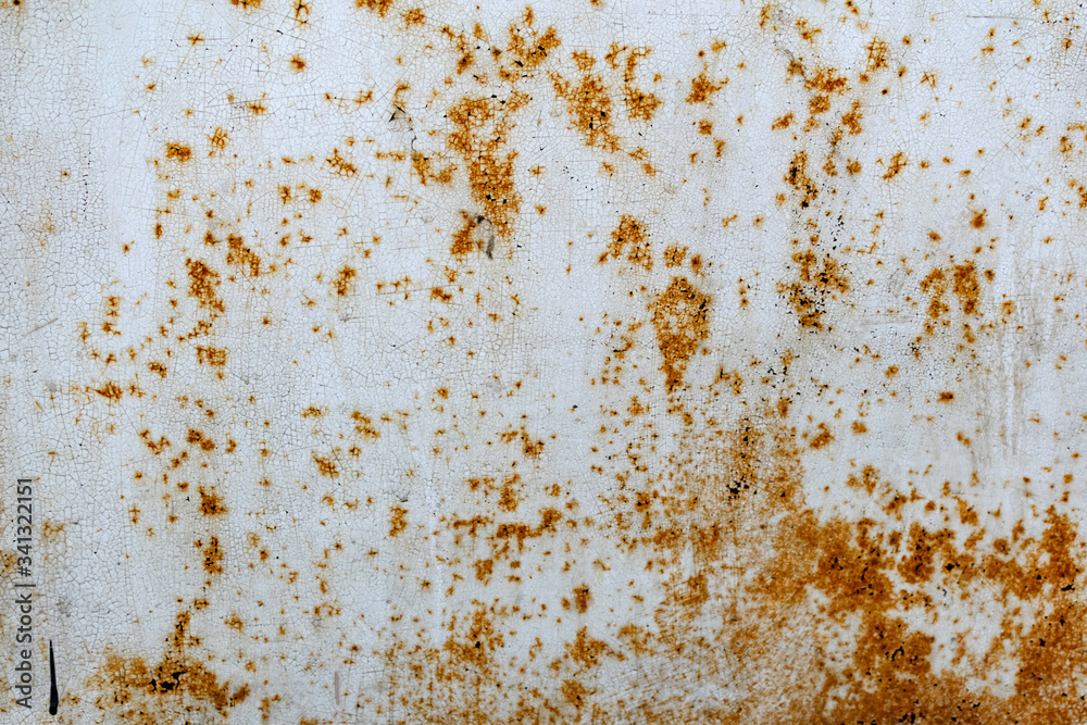 Metal surface with white paint that has passed temporary damage, a lot of formed, red rust. Textured background with traces of destruction and deformation Metal surface with white paint that has passed temporary damage, a lot of formed, red rust. Textured background with traces of destruction and deformation