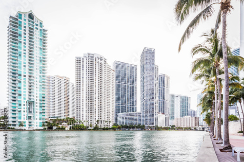 View across the Miami River to the residential skyscrapers of Brickell on an overcast day © Mustard Assets