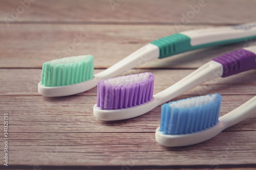 Tooth brush isolated on wooden table  