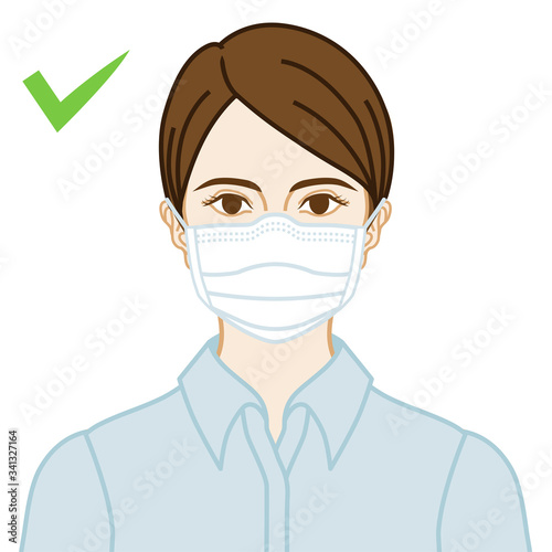 Young woman wearing a face mask correctly - front view
