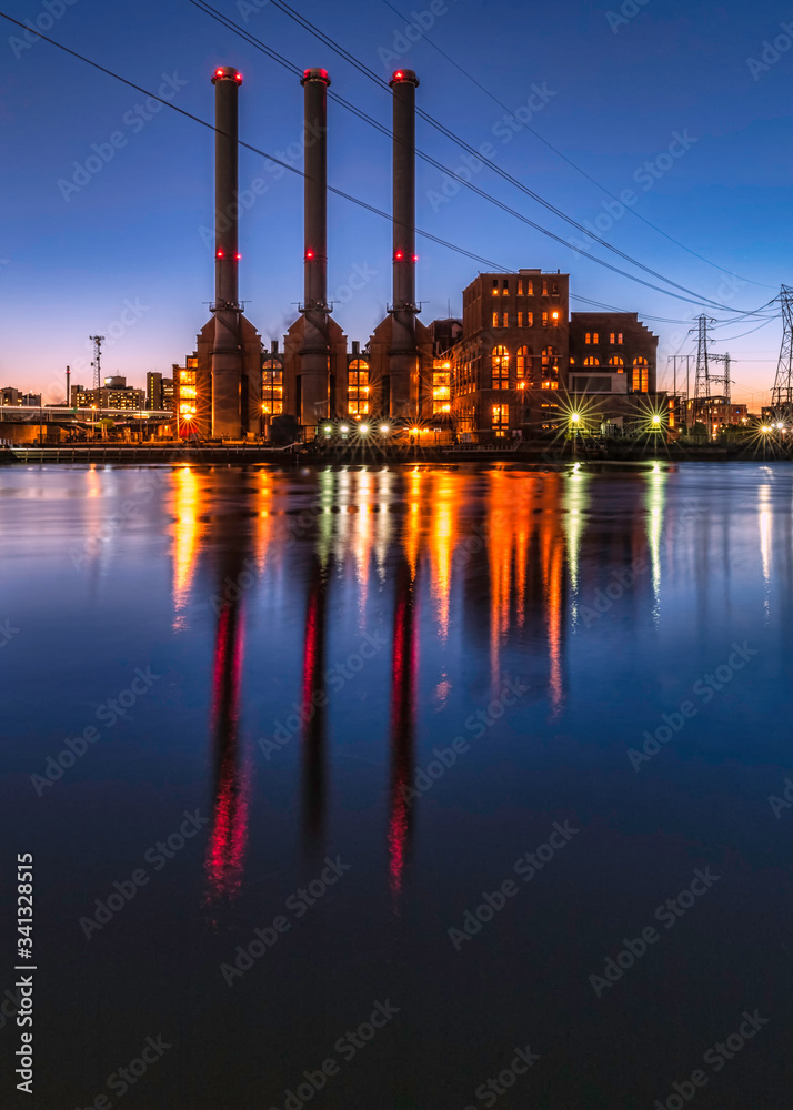 Reflections of the Narragansett Electric power plant in Providence, Rhode Island.