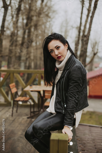 Beautiful young girl on a walk in the park